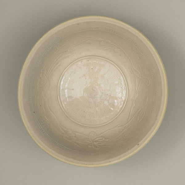 Bowl with Stamped Flower and Slip-Trailed Characters