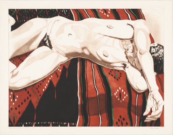 NUDE LYING ON BLACK AND RED BLANKET