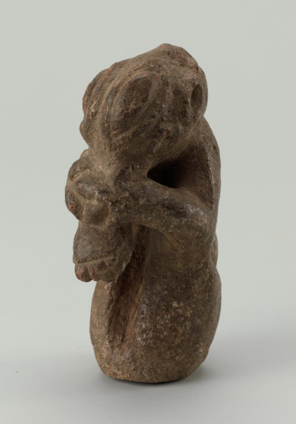 Figure of a Crocodile Holding its Snout