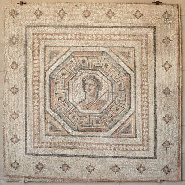 Fragment of floor mosaic depicting a male figure