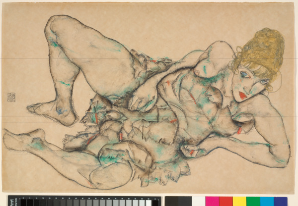 RECLINING WOMAN WITH BLONDE HAIR