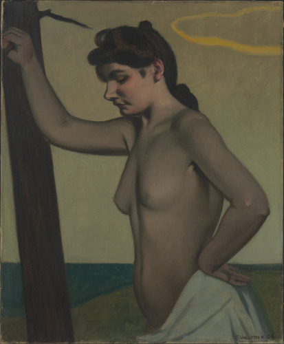NUDE WOMAN LEANING AGAINST A TREE