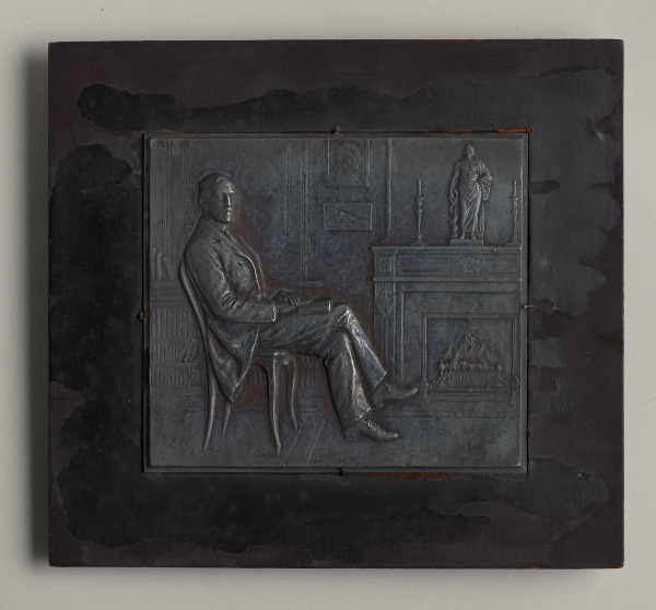 "SCENE OF A MAN SEATED BEFORE A FIREPLACE" PLAQUETTE