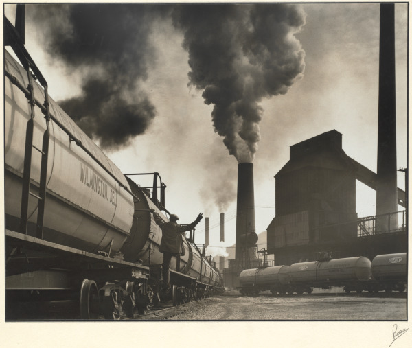 VIEW OF STORAGE BINS AND BELCHING SMOKESTACK (DUPONT PLANT, WILMINGTON)