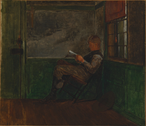 YOUNG MAN READING