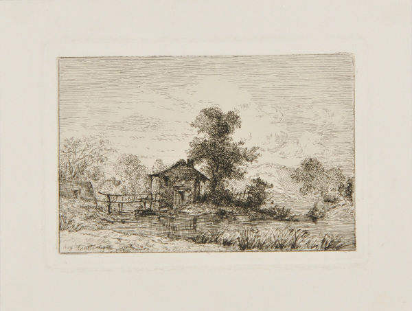 Small cottage by a pond