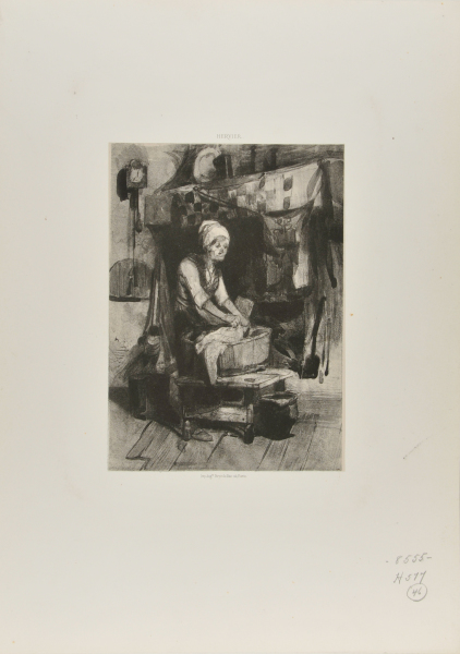 OLD WOMAN WASHING CLOTHES IN A BUCKET