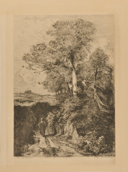 WOMAN WALKING ALONG A PATH