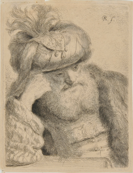 A BEARDED MAN WEARING A TURBAN, LEANING HIS HEAD ON HIS RIGHT HAND