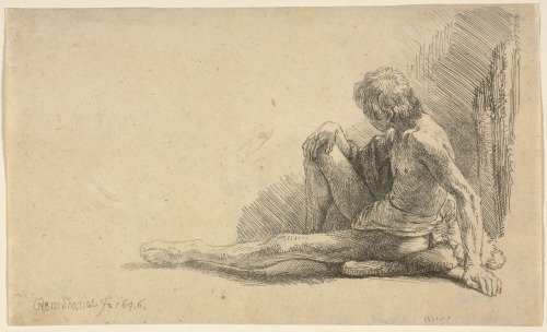 NUDE MAN SEATED ON THE GROUND WITH ONE LEG EXTENDED