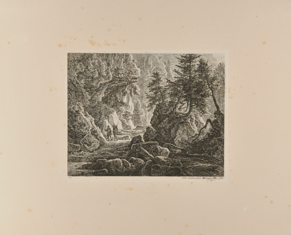 TWO TYROLEANS WALKING ALONG A PATH IN A RAVINE