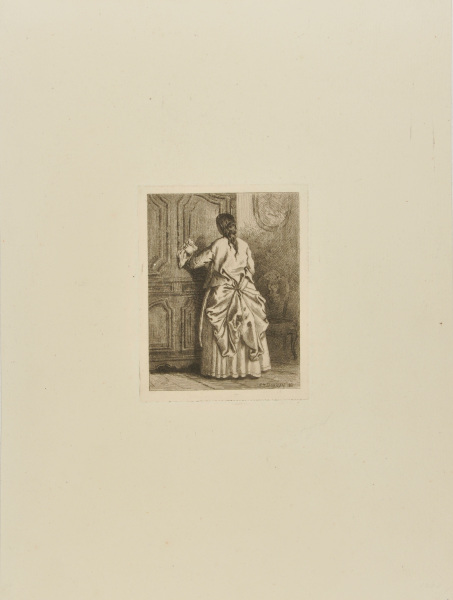 WOMAN DUSTING A CABINET