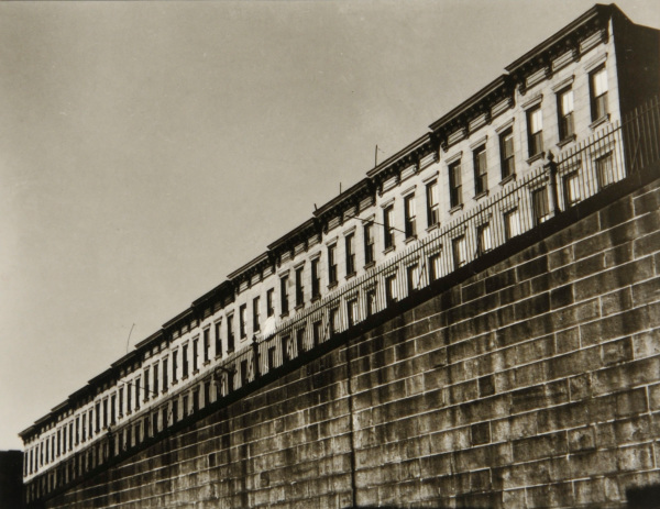ROW HOUSES AND STONE WALL,