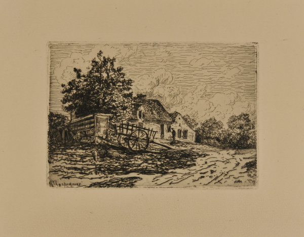 CART IN FRONT OF A FARM