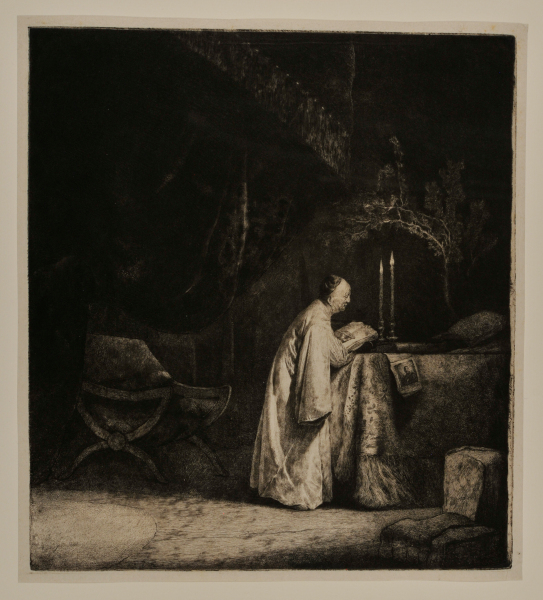 PRIEST WRITING AT AN ALTAR