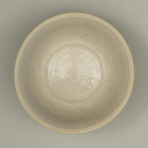 Bowl with Stamped Flower and Slip-Trailed Characters