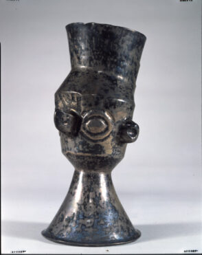 Beaker in the shape of a human head