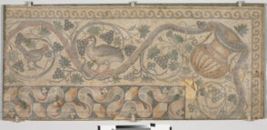 Fragment of floor mosaic depicting a scrolling vine and birds