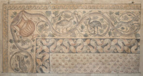 Fragment of floor mosaic depicting a scrolling vine and birds