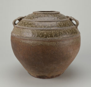 Storage Vessel with Incised Scroll Design and Mask Handles