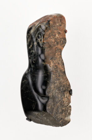 Female Form Embedded in Stone