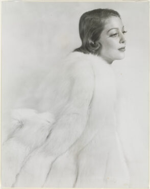Woman in a White Fur Coat