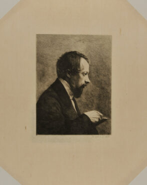 Profile Portrait of Man Holding a Book