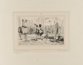 Travelling performer with monkeys and dogs in a town center