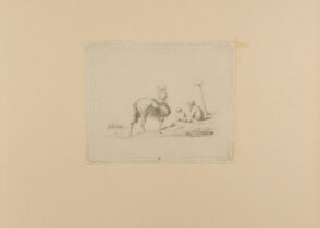 Man and Boy Sitting on Ground Near Donkey with Saddle Bags