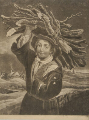 Boy Carring a Bundle of Sticks on His Head