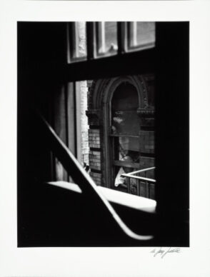 Woman Looking out of Window