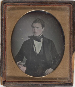 Man Holding Daguerreotype