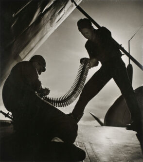 Loading a `Helldiver’ with 50-Caliber Shells